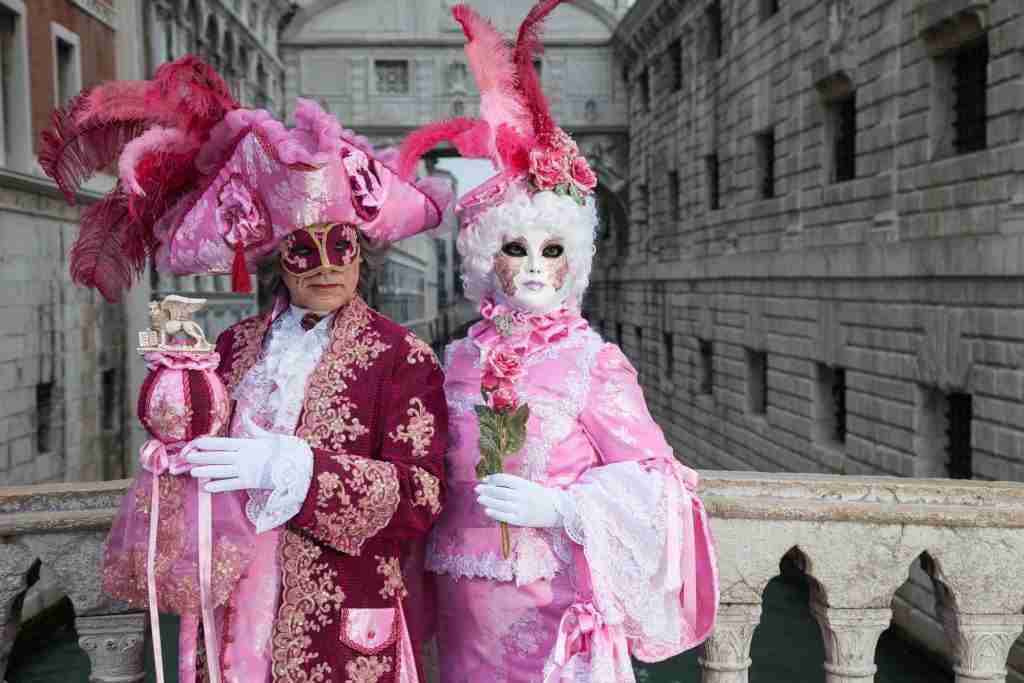 A costumed Carnevale celebrants in Venice